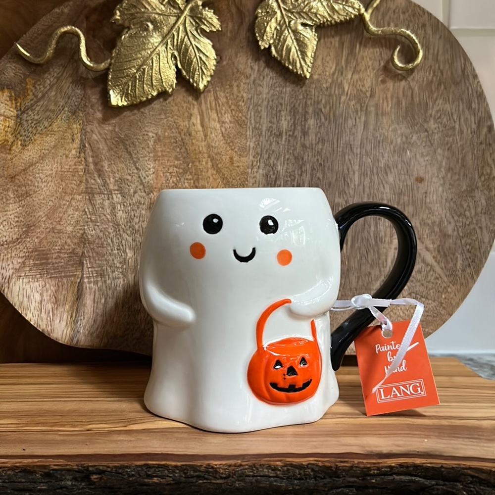 Ghost holding pumpkin mug